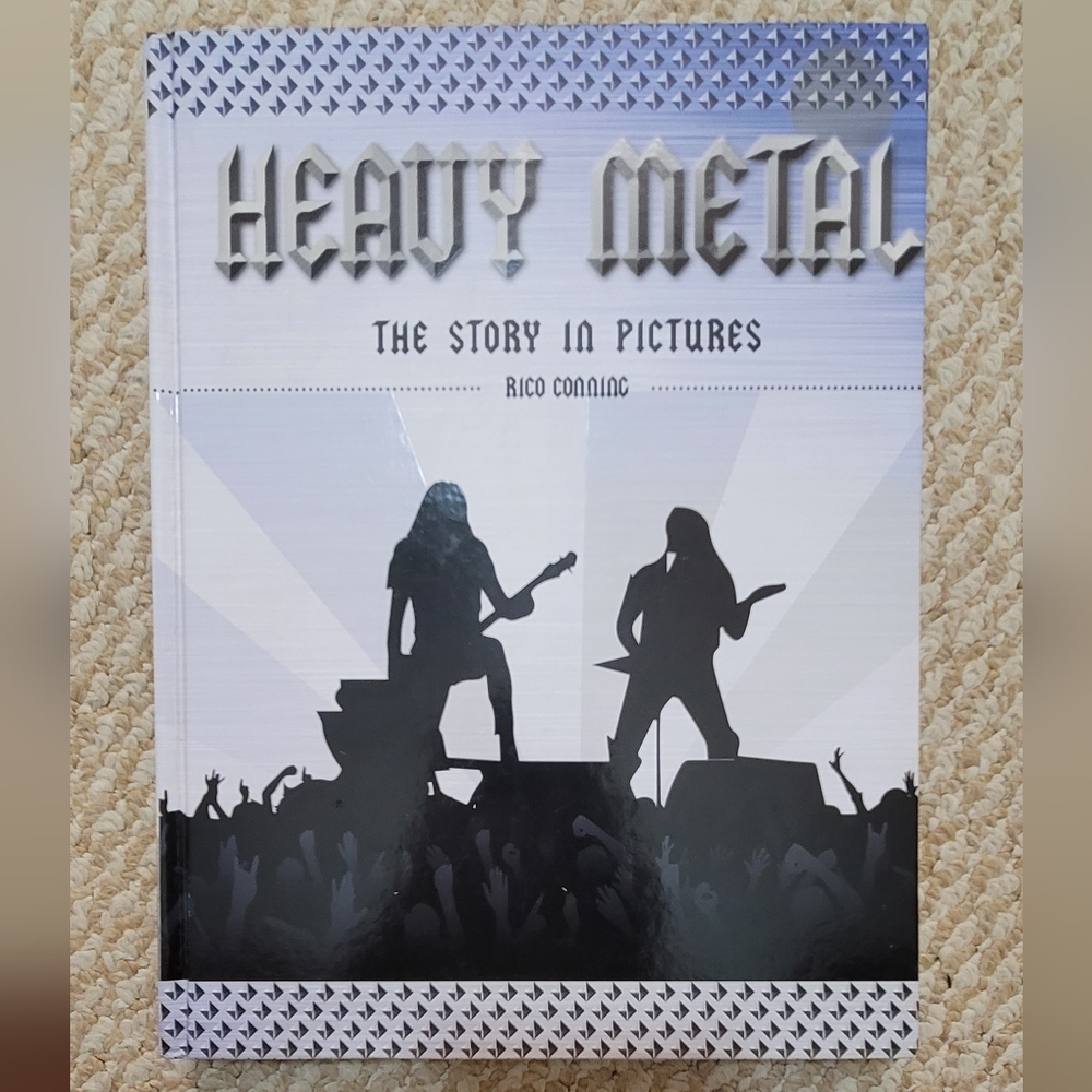 Heavy Metal: The Story in Pictures, 224 Pages,  Excellent Used Condition.